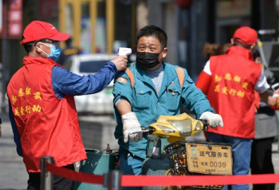 Reduce China nivel de respuesta a pandemia de coronavirus