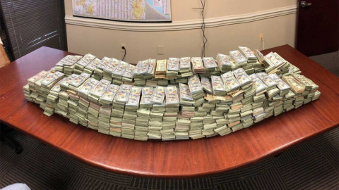 Detienen camión, llevaba 3 mdd en barriles con carne de puerco