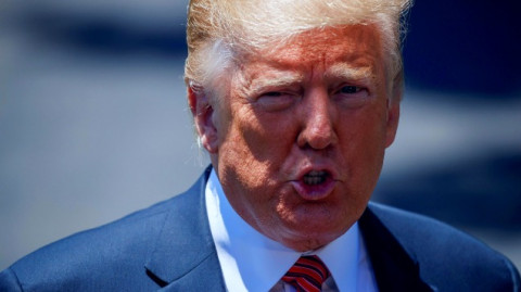 Trump declara ante fotografía de padre y su bebé ahogados