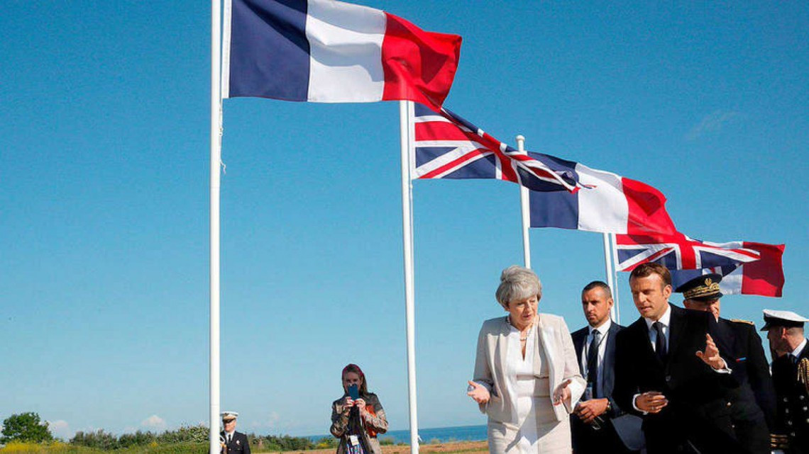 May y Macron rinden homenaje al "valor" de los veteranos del Dia-D 