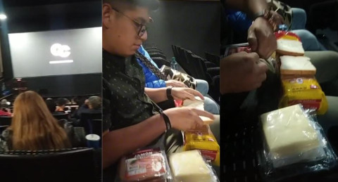 Joven prepara sándwiches en plena sala de cine